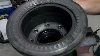 How to remove and replace a rear rotor 2001 dodge ram 3500 dually 2 of 4