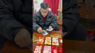 Preparing our red envelope for Chinese new year # hongpao # luckyredenvelope #shortvideosonyoutube