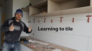 Learning to tile