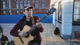 Some fingerstyle playing on the street. Anton Savin - guitar (fragments)