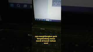 cara menghilangkan garis berwarna merah di bawah tulisan microsoft word.