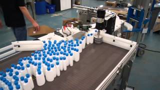 Oval Shaped Lotion Bottles On A Bi Flo Accumulation Table