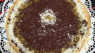 Ciao a tutti questa è la nostra crostata con crema al pistacchio e cioccolato