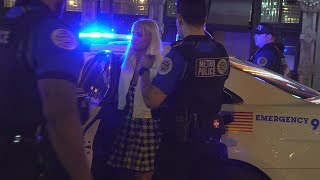 Woman arrested by metro police officers