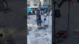 Musician in Old Montreal did the cover of Bitter Sweet Symphony by The Verve