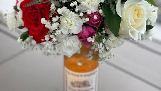 Arreglo de Flores en botella