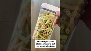 Simple mom hack to reduce snack food waste & save money on groceries.  Decant your snacks.