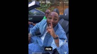 Pastor Tobi and Davido listening to FEM in his Bentley