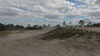 TRAILMASTER 150XRS GIVING IT HELL @ FLORIDA TRACKS AND TRAILS