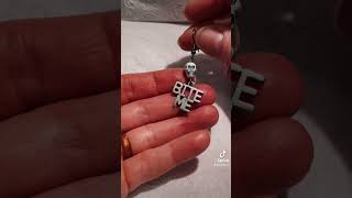 Making earrings from 1990s Bite Me charms. I make & sell earrings randomly