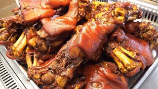 korean soul food braised pig's trotters, korean pig feet, jokbal / korean street food - 4K 60FPS UHD