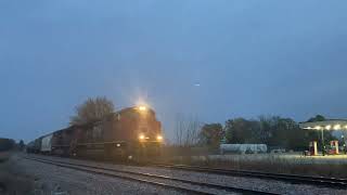 CN 8023 leads westbound freight through New Hartford, IA 10/28/24