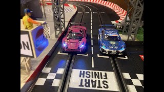 Carrera Digital 132 Slot Car Race: Iron Dames GT Ferrari #85 vs. HYLO GT Audi #7.