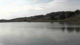 lake, hot in Ukraine, people swimming 21 07 2024 far from the war