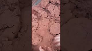 Red dirt damp shapes floor crumbling