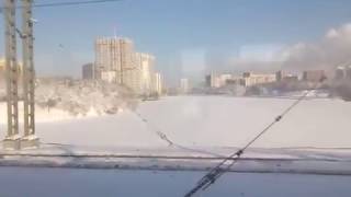 Замедленное видео с панорамой московского снега с железной дороги