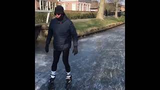 Ice Skating on the canals of Giethoorn Town in Netherlands