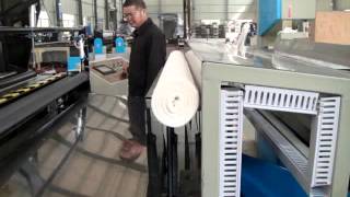 Automatic Toilet Roll Making and Cutting Machine-deck transfer with auto bandsaw cutting