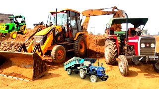 Jcb 3DX Xpert Backhoe Loader in Action: Loading Mud into Massey and John Deere Tractors | Jcb Video