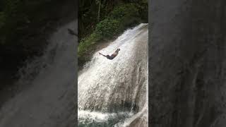 AMAZING! Fearless Man Dives off of Waterfall (Slow-Motion)