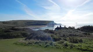 Seven Sisters Sussex, a view of the Cuckmere and  the coastguard cottages in September 2024.