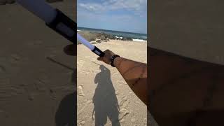 Lightsaber spinning at the beach! #shorts