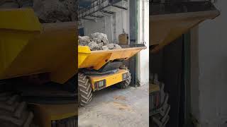 Removal of rubble by dump truck from the hall