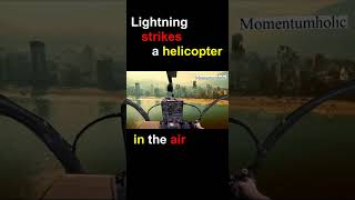 A lightning strikes a helicopter in the air