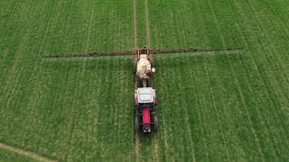 A Norfolk Tractor Spraying by Drone