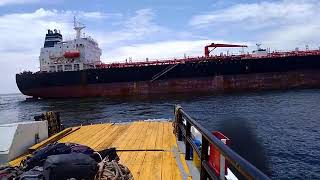 Merchant Navy officers and crew signing off from a ship