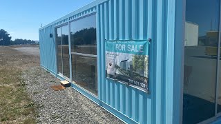 Tiny home made out of a shipping container walk around