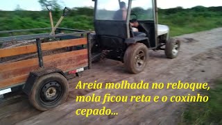 Areia molhada no reboque, mola ficou reta e o coxinho cepado...