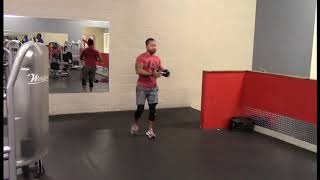 Dumbbell Walking Lunge with Twist