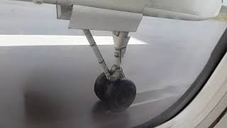 Dash Q400  - Take off from Szczecin airport -  view from inside the plane