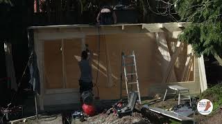 Partial installation of a Lillevilla 345 log cabin - High angle close up timelapse