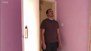 Man Walks into Room and Looks Around Naturally