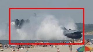 Russian Navy Hovercraft Lands On Busy Beach