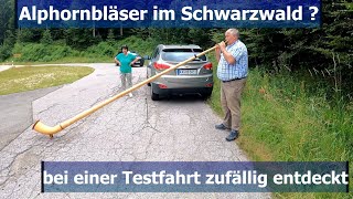 Alphorn players in the Black Forest? accidentally discovered during a test drive