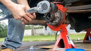 How to adjust the rear wheel tapered roller bearings on a Chevy 2500HD WITHOUT a special socket.