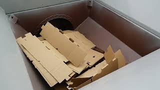 Komar Auger Compacting Cardboard Boxes