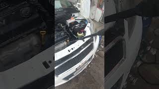 como lavar el motor de un Chevrolet Aveo