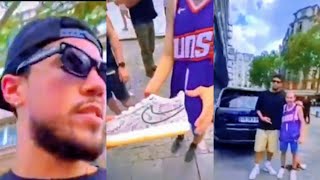 Devin Booker Giving His Sneaker Shoes to his Lucky Fans in a Street of Paris