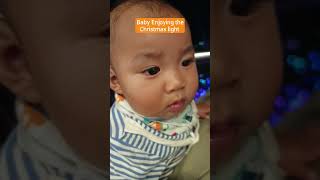 Cute little baby enjoying the Christmas light #viralvideo #littlebaby #baby #cutebbaby