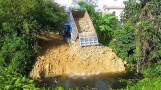 Amazing Next Work Action Never Seen,Truck And Bulldozer Cooperate PushSoil To Clear DeepPit In Water