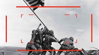 The Story Behind The Flag Raising on Iwo Jima by Joe Rosenthal (1945)