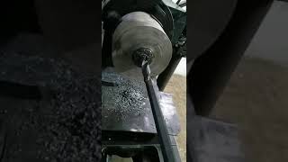 Drilling a hole in Adamite solid piece on lathe by high speed customized Drill