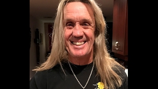 IRON MAIDEN Nicko McBrain wearing a Silver Cross Necklace by LUGDUN ARTISANS