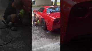 Scrubbing his HOTROD! 🔥🔥 #car #carshorts #corvette #carwash