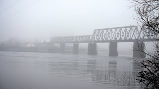 Train On Bridge In Fog