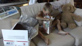 Cole Opening Birthday Presents From Uncle Ryan and Aunt Becky (1)